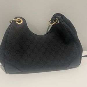 Gucci Black Shoulder Bag with Gold Accents